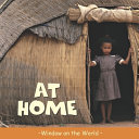 Book cover of AT HOME