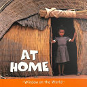 Book cover of AT HOME